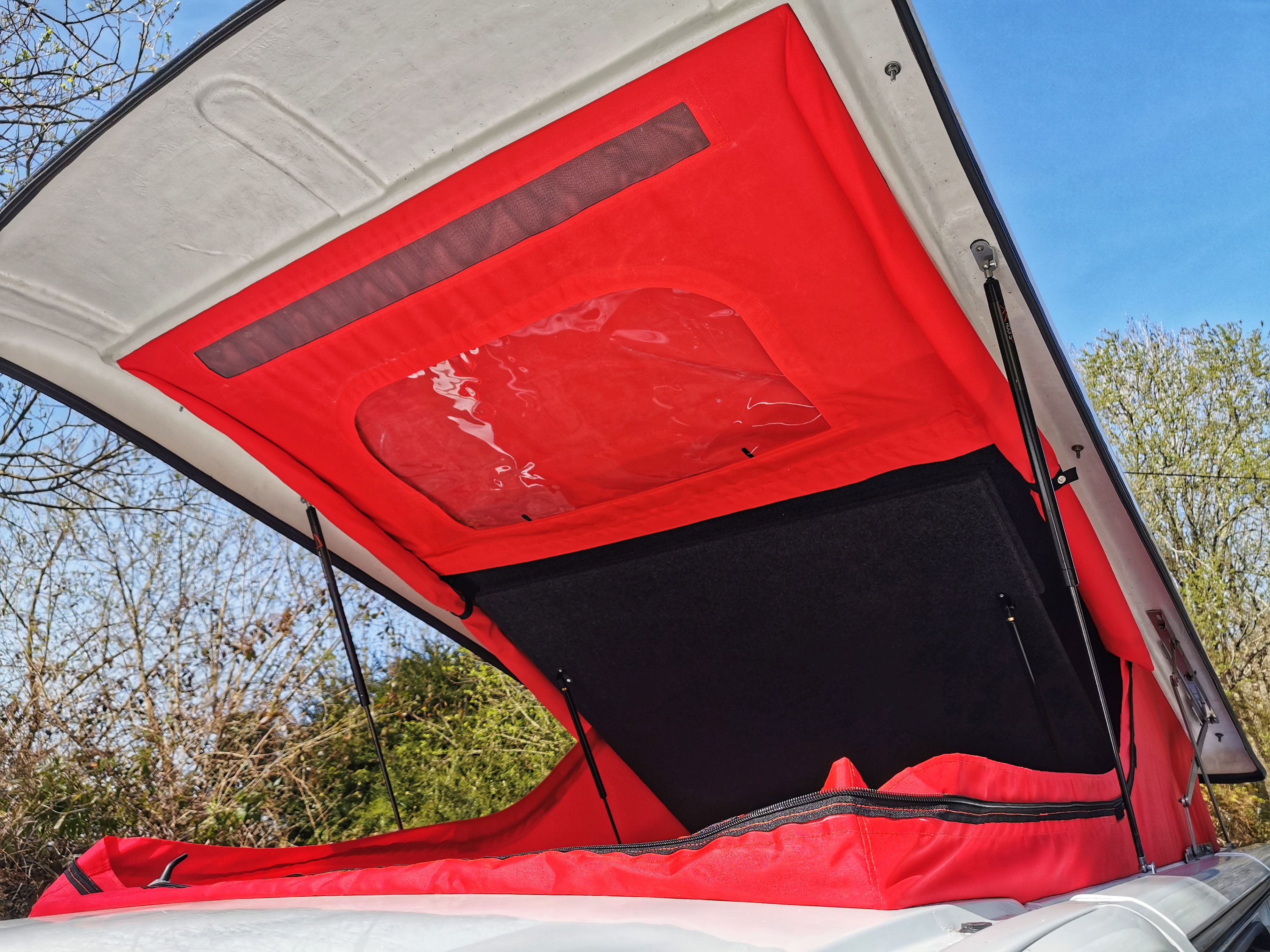 Red elevating pop-top roof canvas