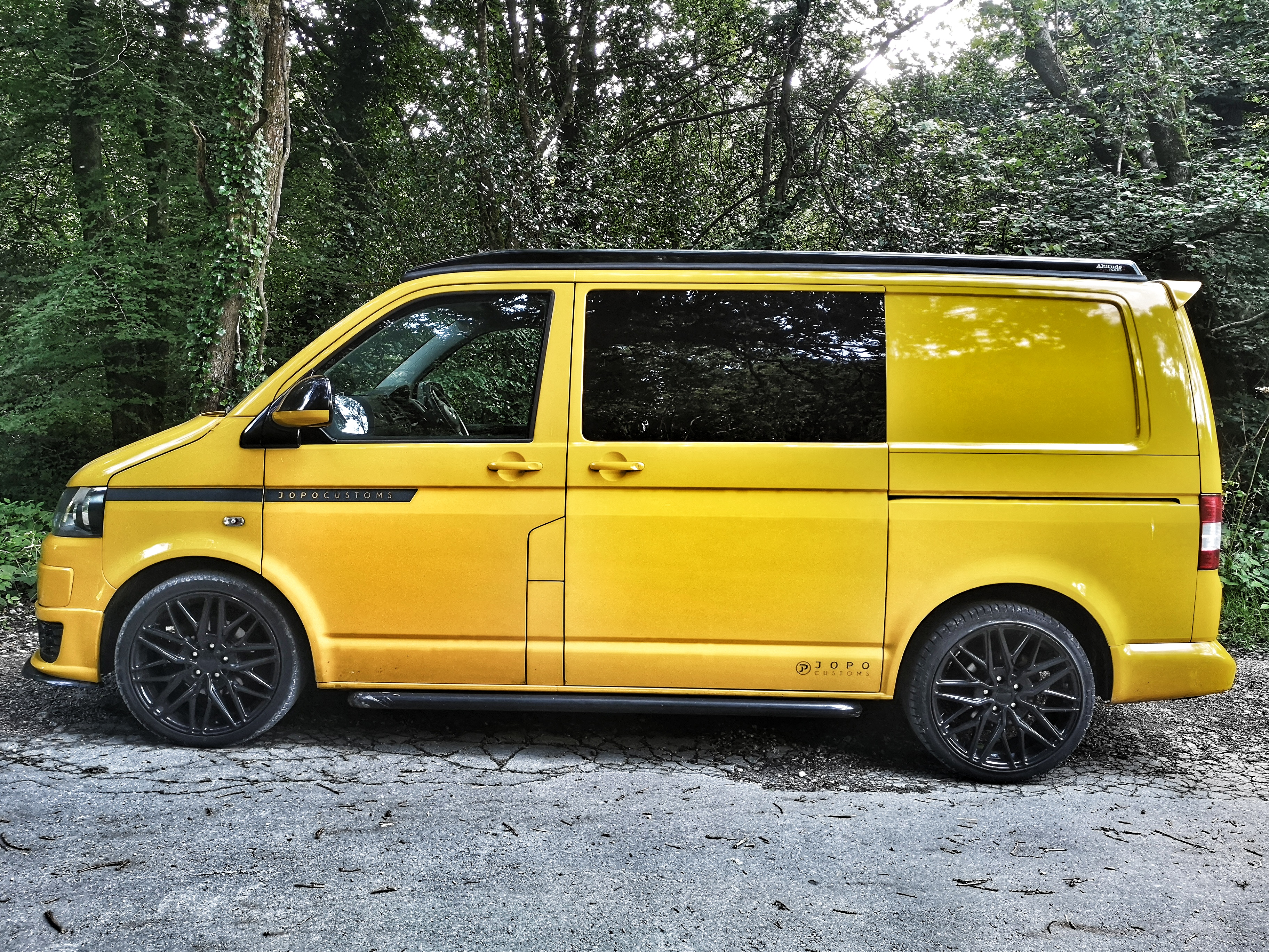 Yellow campervan with elevating/pop toproof